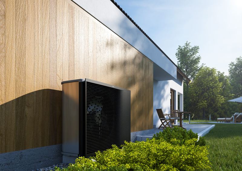 Outdoor unit in front of a timber facade